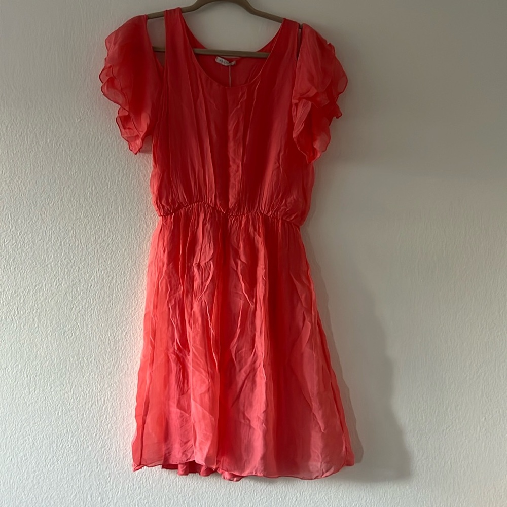 Brand new dress size is probably S, received as a gift, no tags on